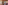 Tuscan living dining room, exposed beams, terracotta floor, leather sofa.