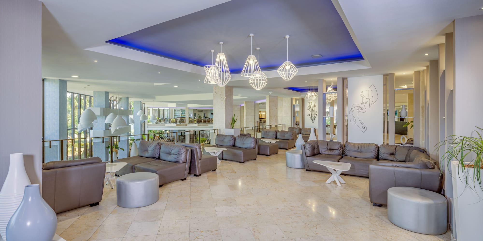 a large room with couches and tables