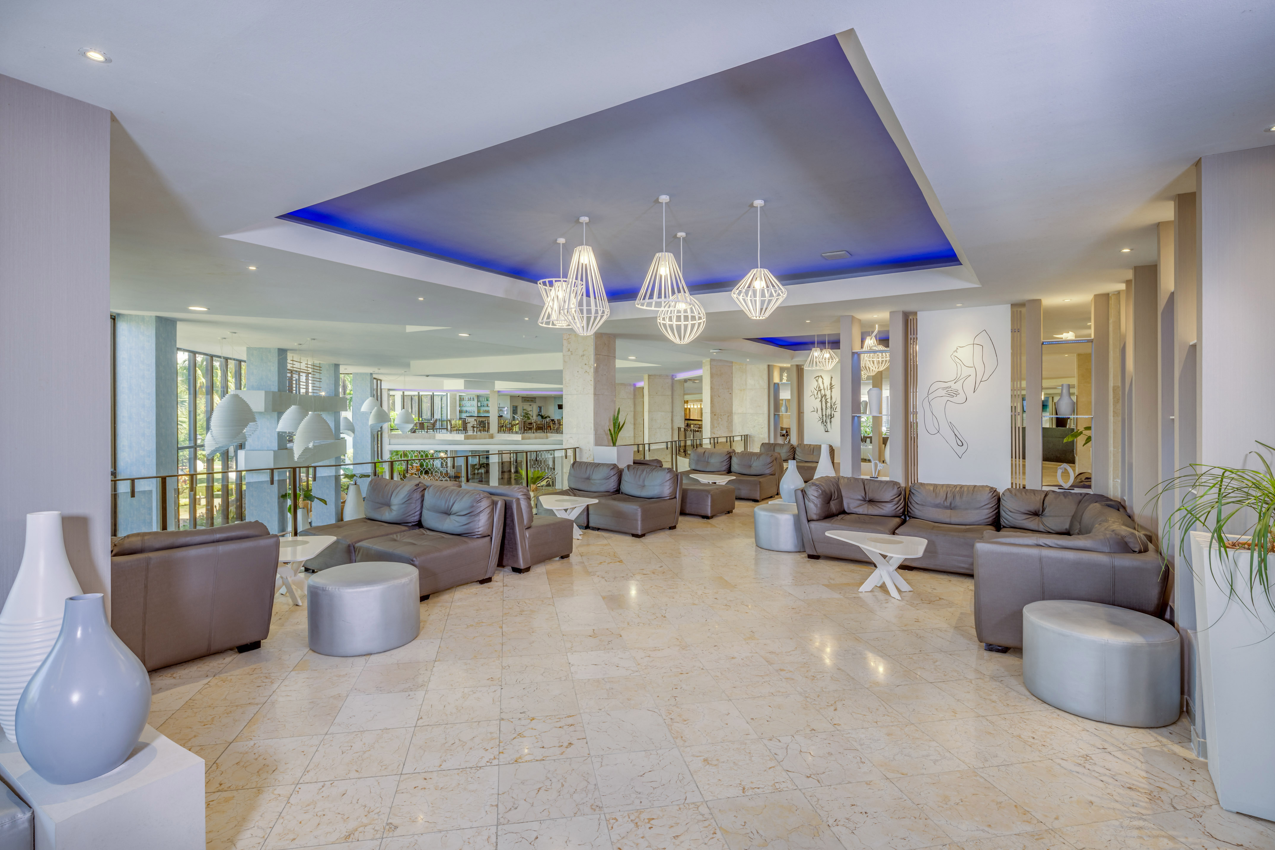 a large room with couches and tables