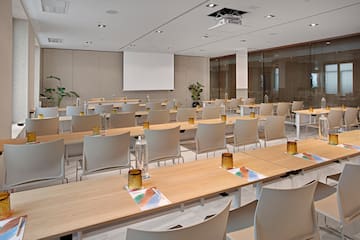 a room with tables and chairs