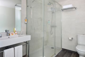 a bathroom with a glass shower