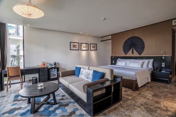 a room with a bed and a couch