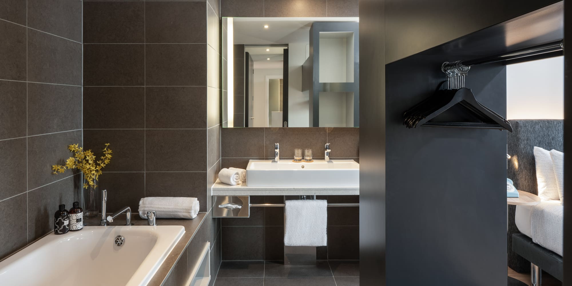 a bathroom with a bathtub and sink