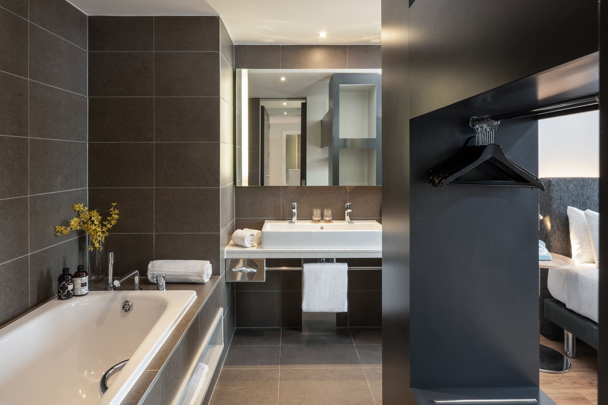 a bathroom with a bathtub and sink