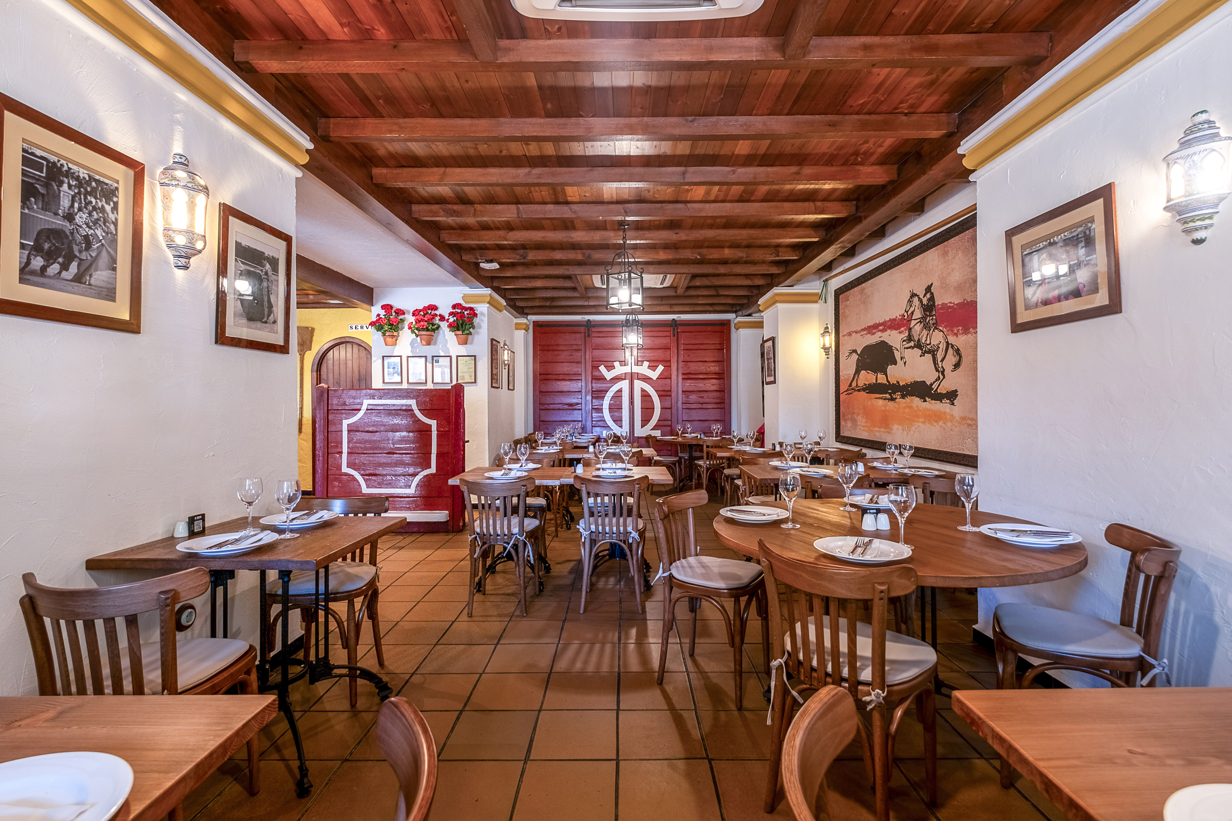 a room with tables and chairs