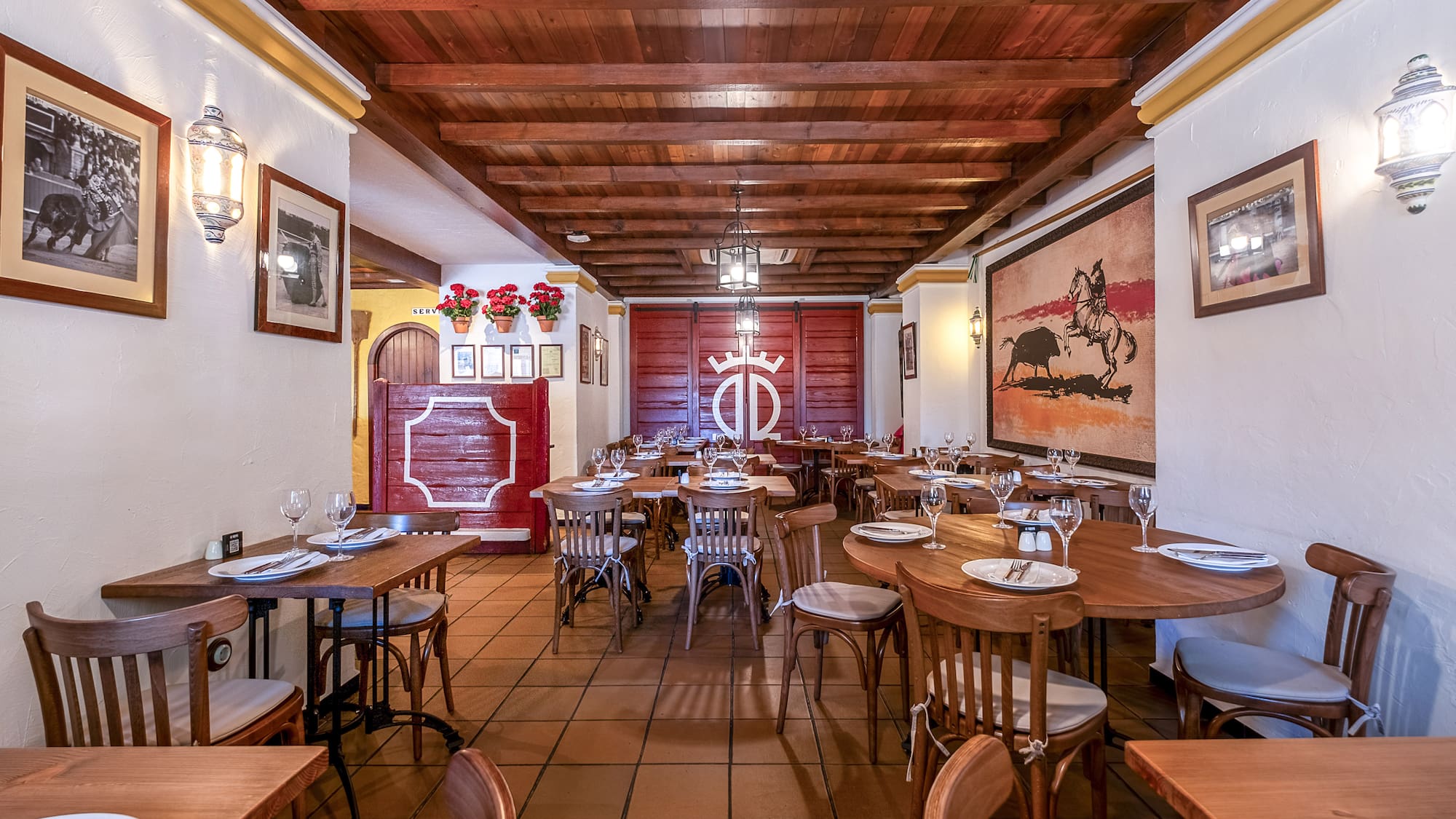 a room with tables and chairs