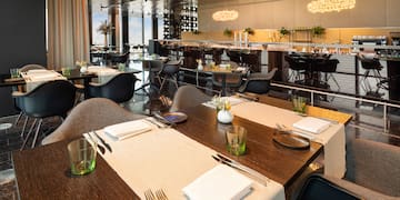 a restaurant with tables and chairs