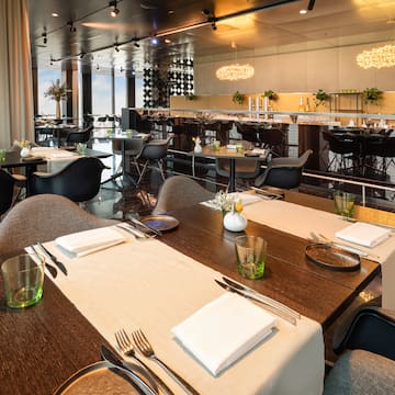 a restaurant with tables and chairs