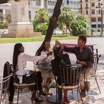 a group of people sitting at a table