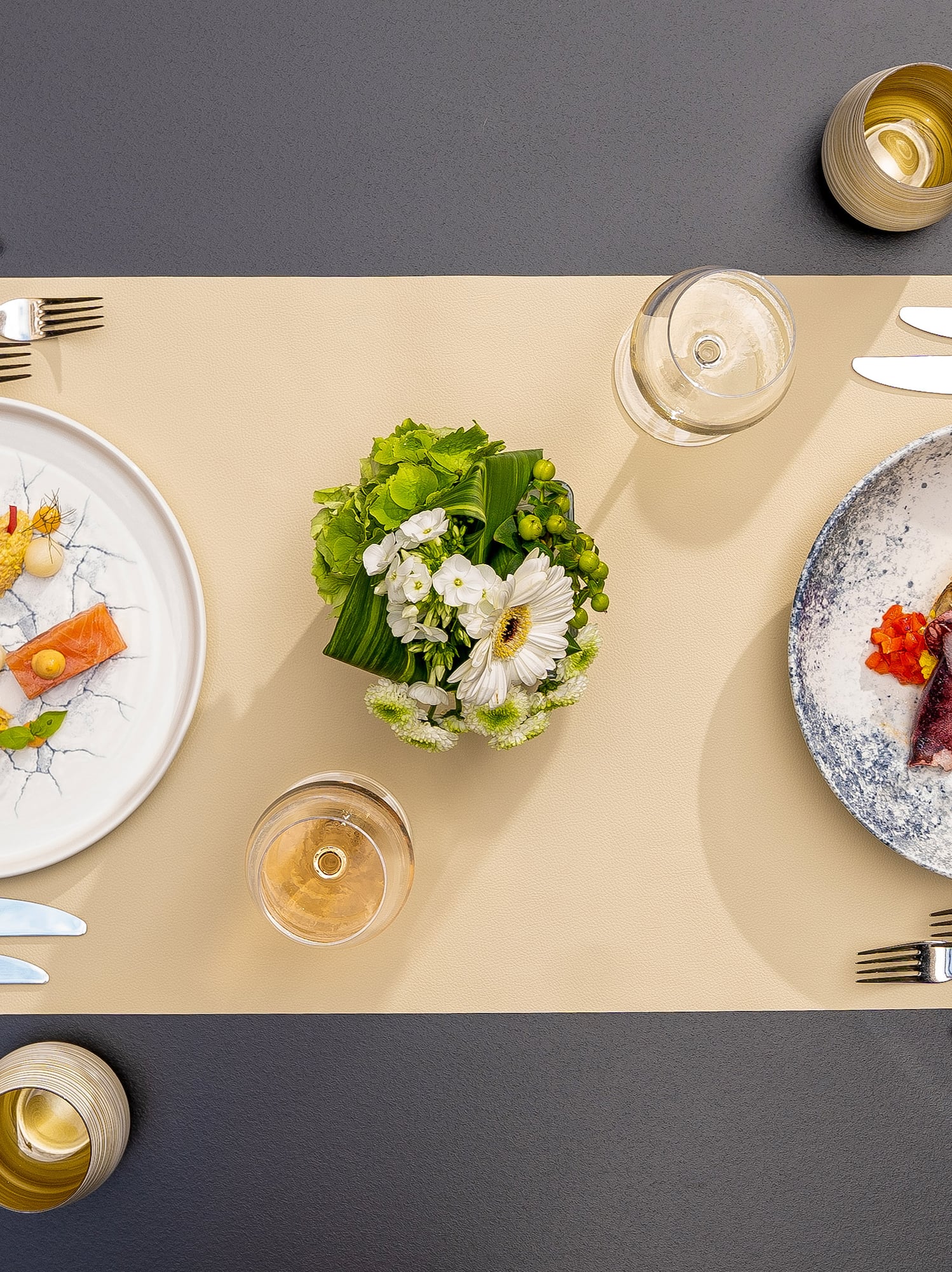 a table with plates and silverware