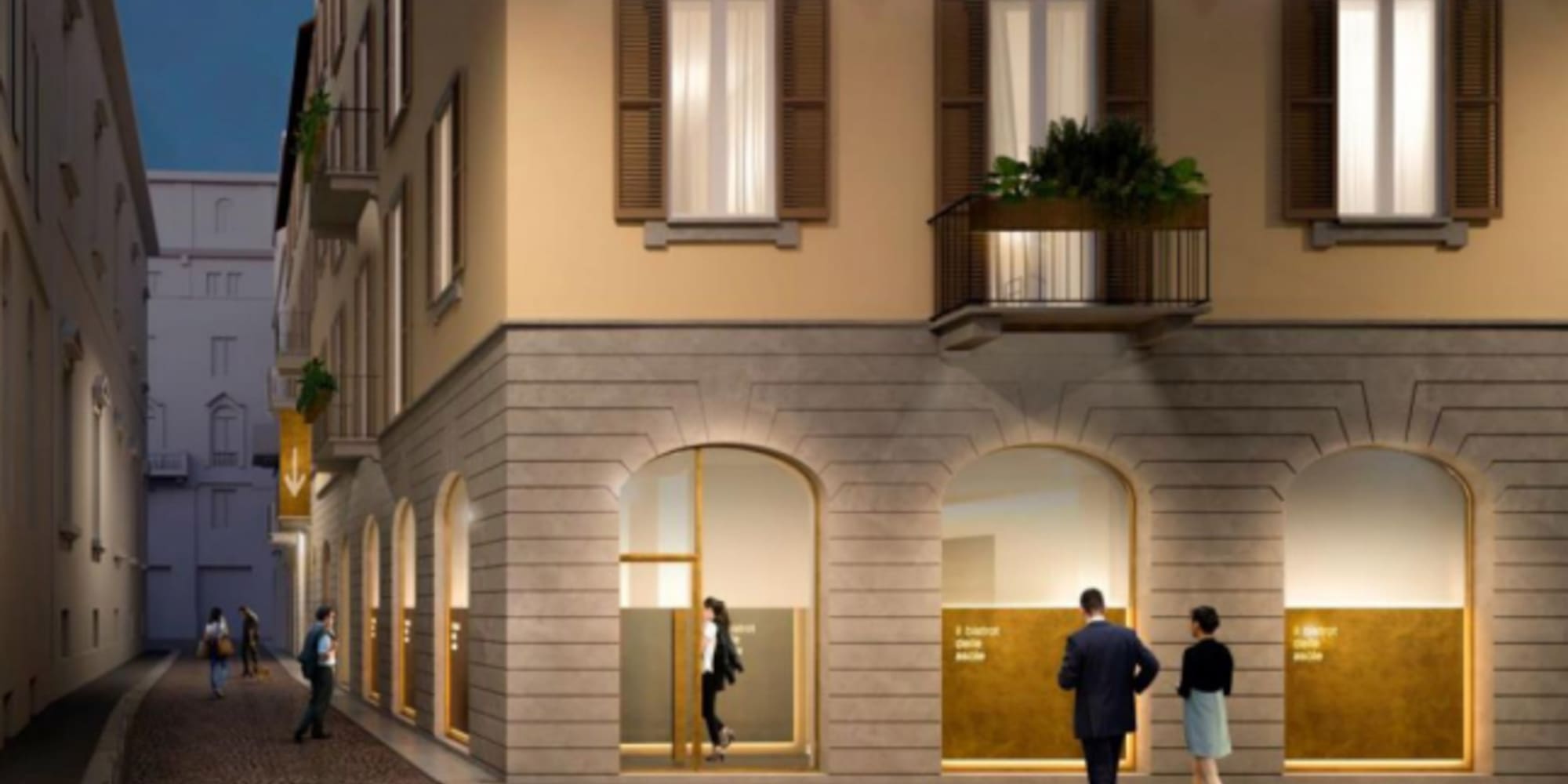 a group of people walking in front of a building