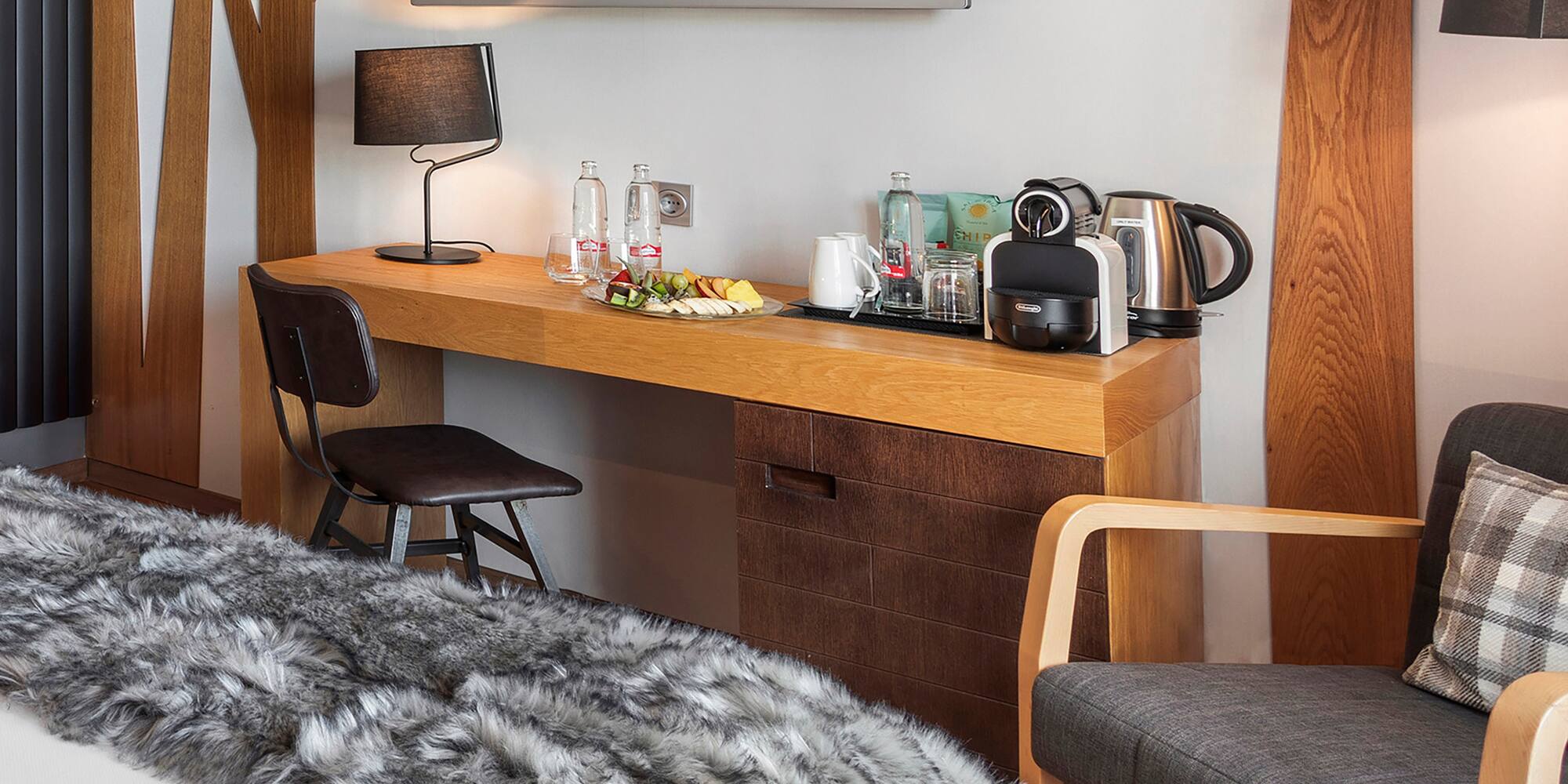 a room with a bed and a tv