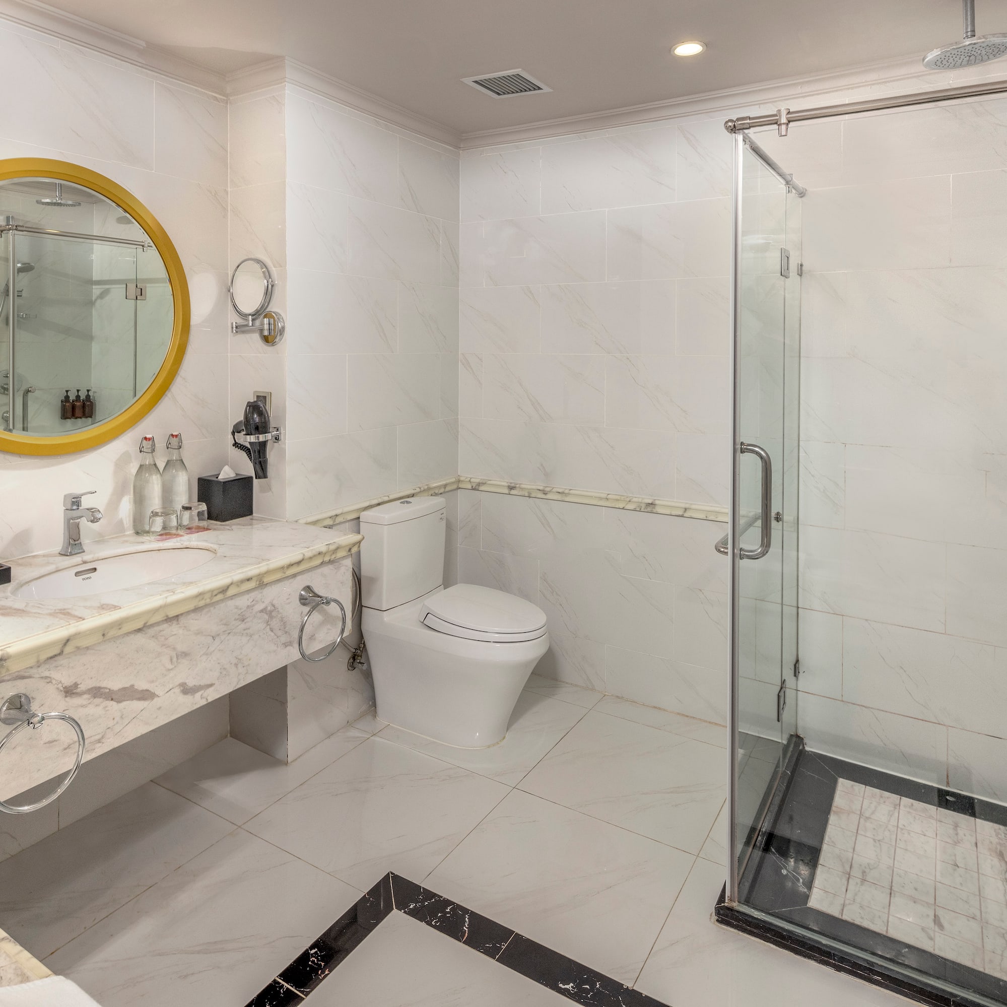 a bathroom with a shower and sink