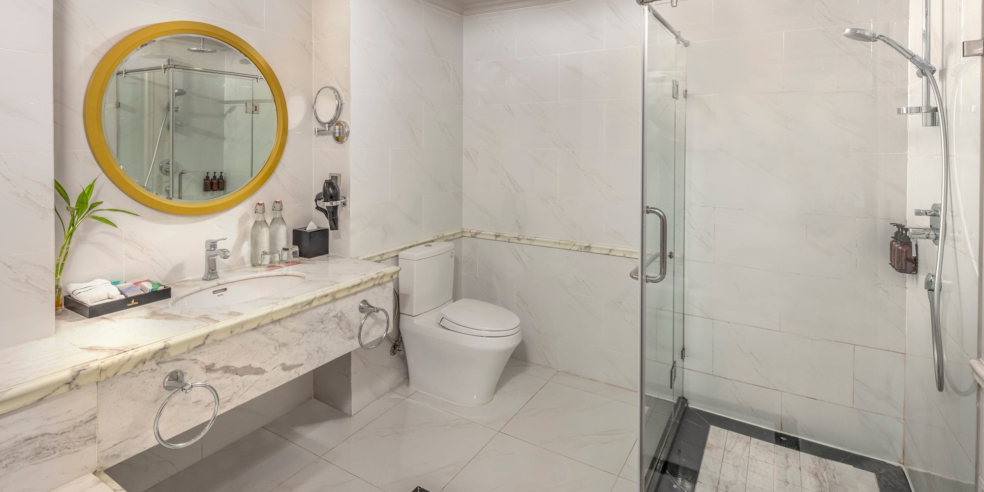 a bathroom with a shower and sink