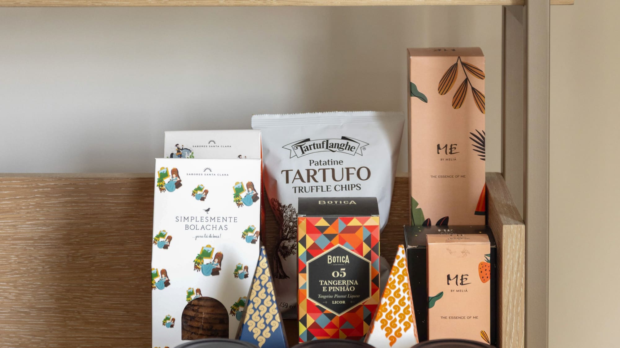 a shelf with different containers of spices
