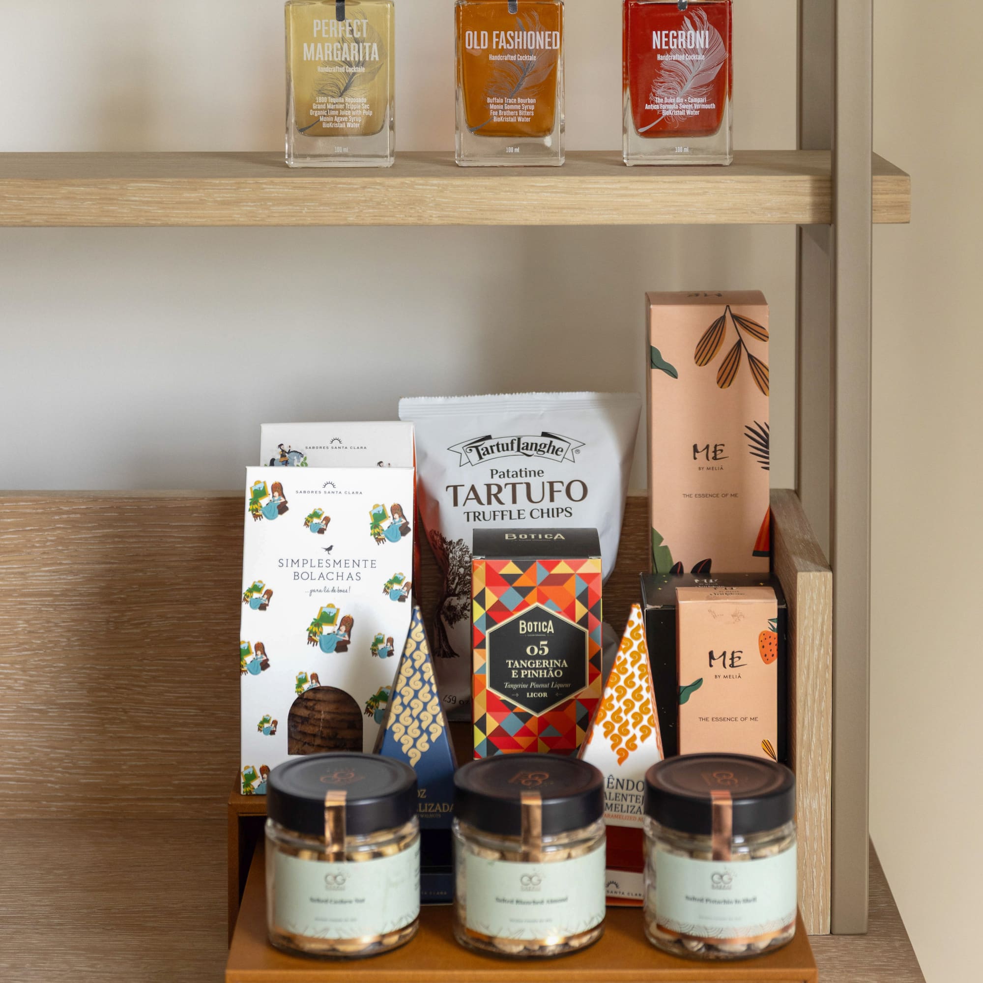 a shelf with different containers of spices