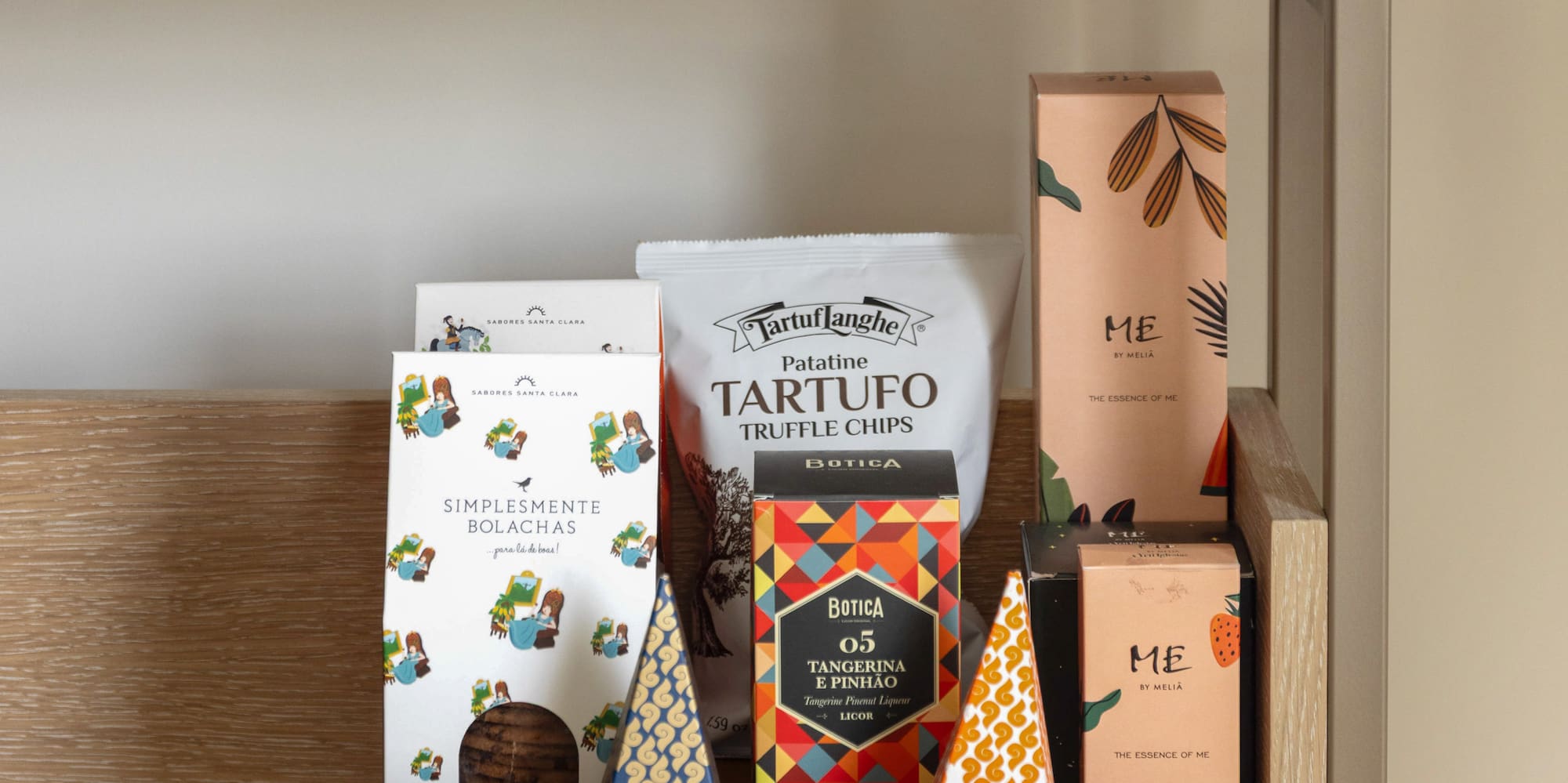 a shelf with different containers of spices