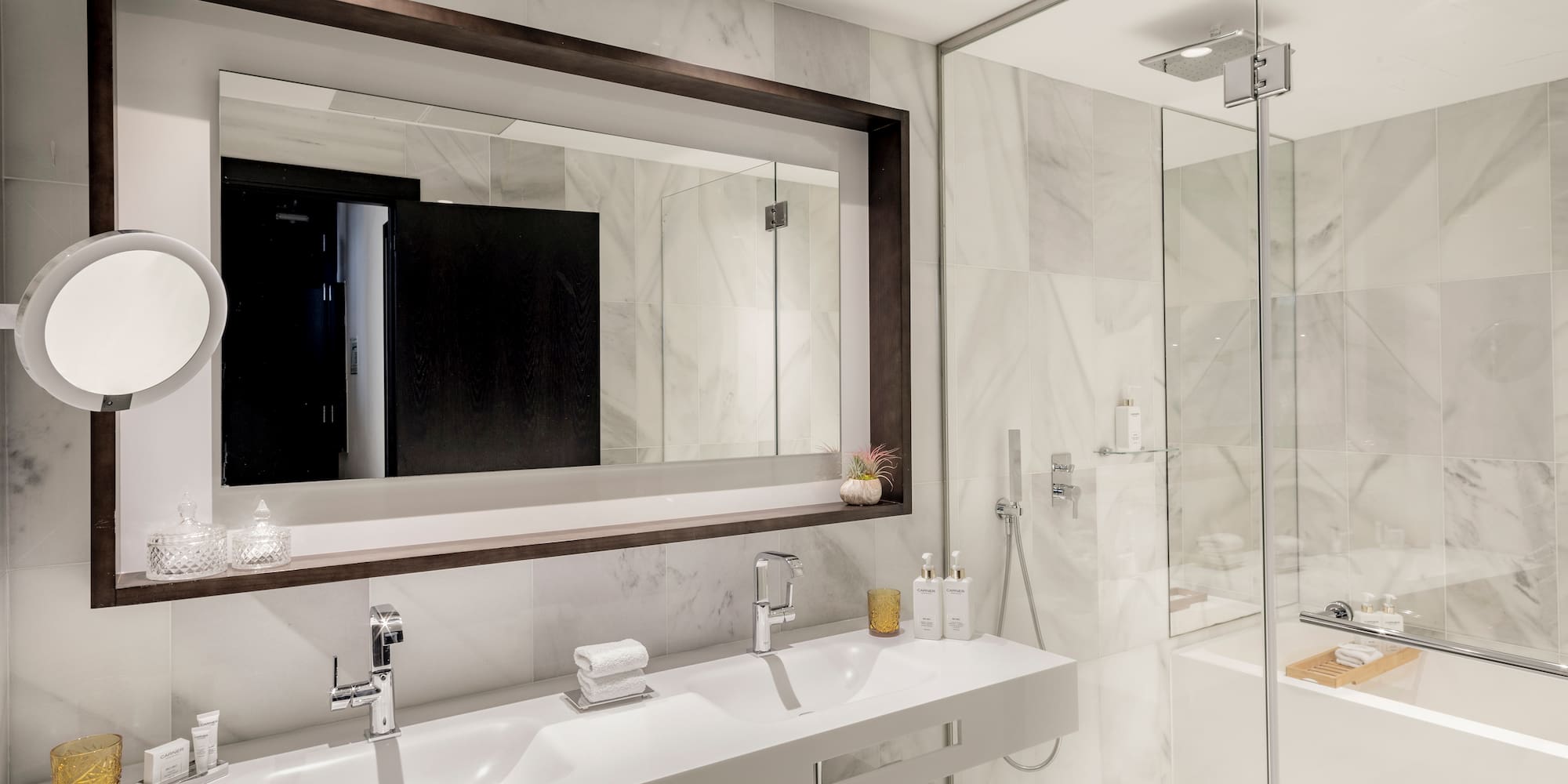 a bathroom with a mirror and sinks