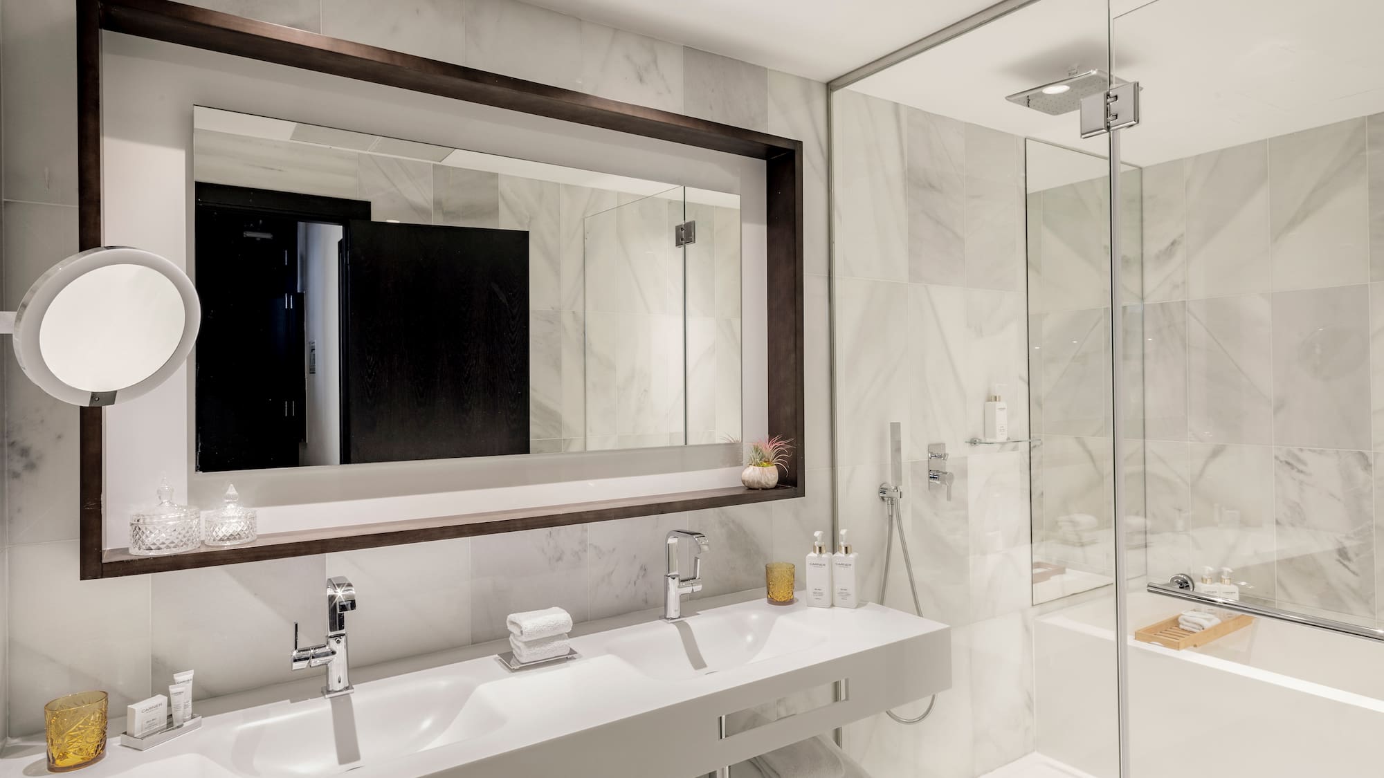 a bathroom with a mirror and sinks