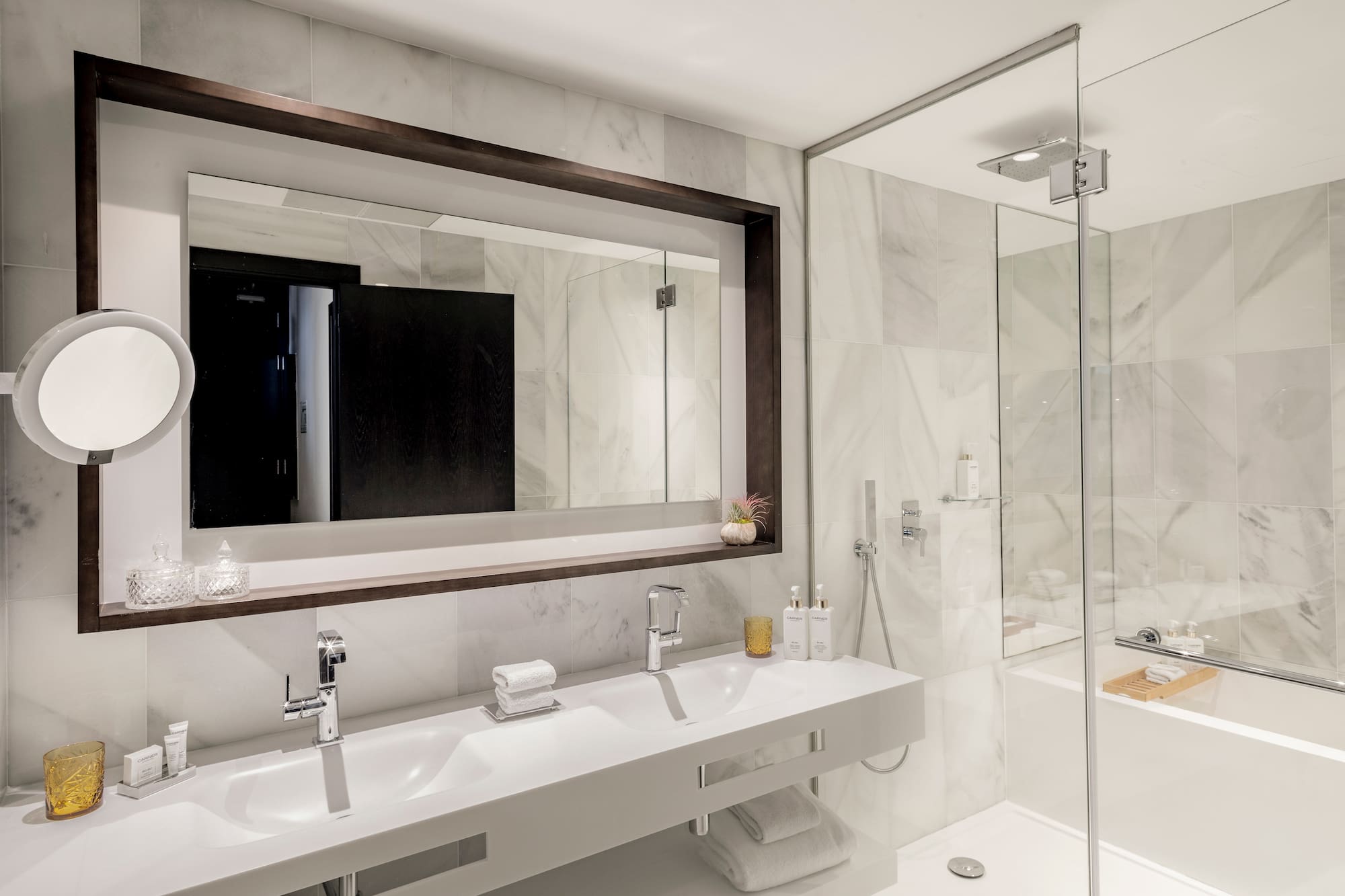 a bathroom with a mirror and sinks