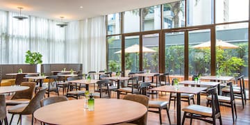 a room with tables and chairs