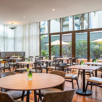 a room with tables and chairs