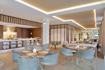 a room with tables and chairs