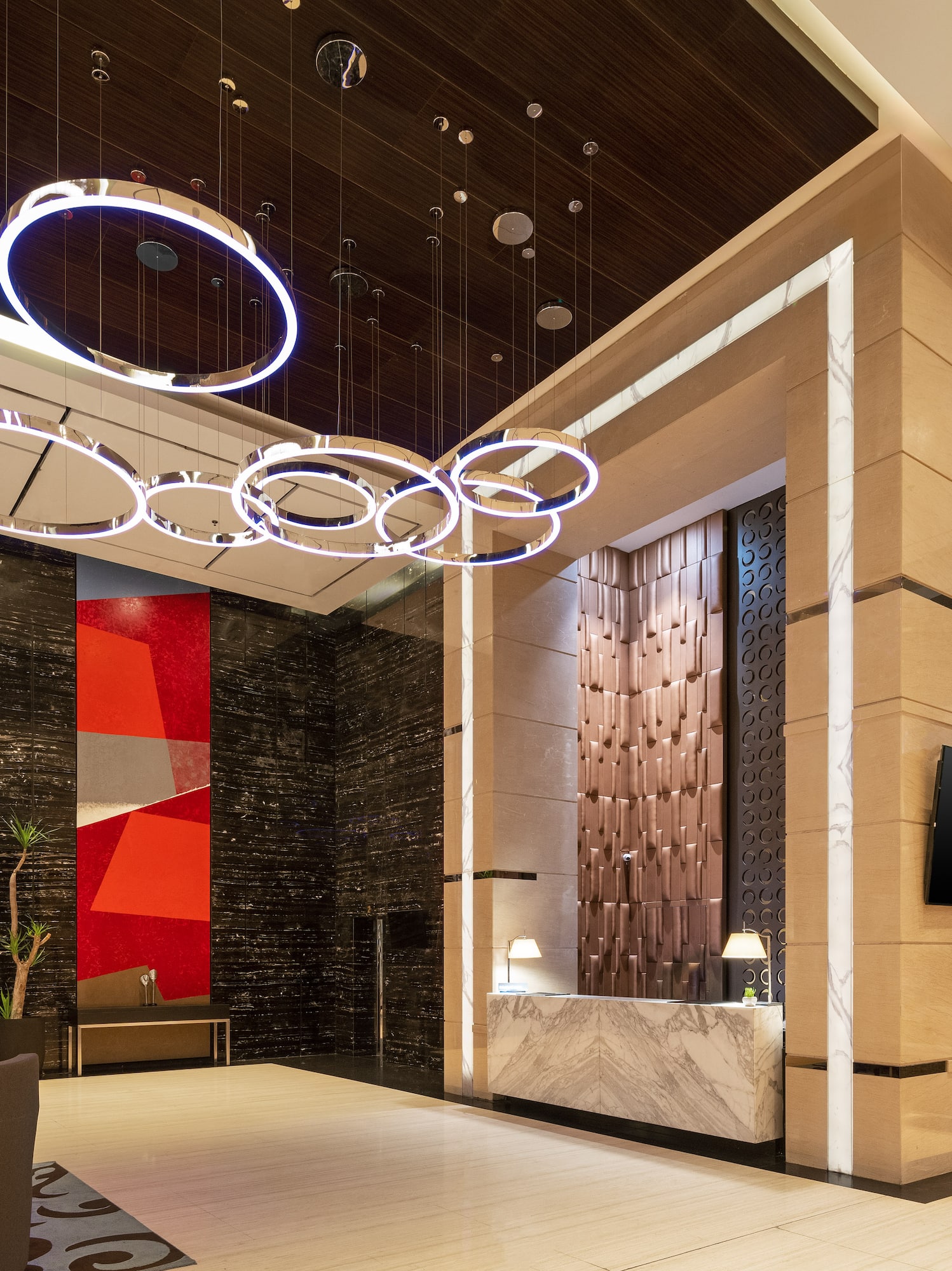 a lobby with a reception desk and a counter