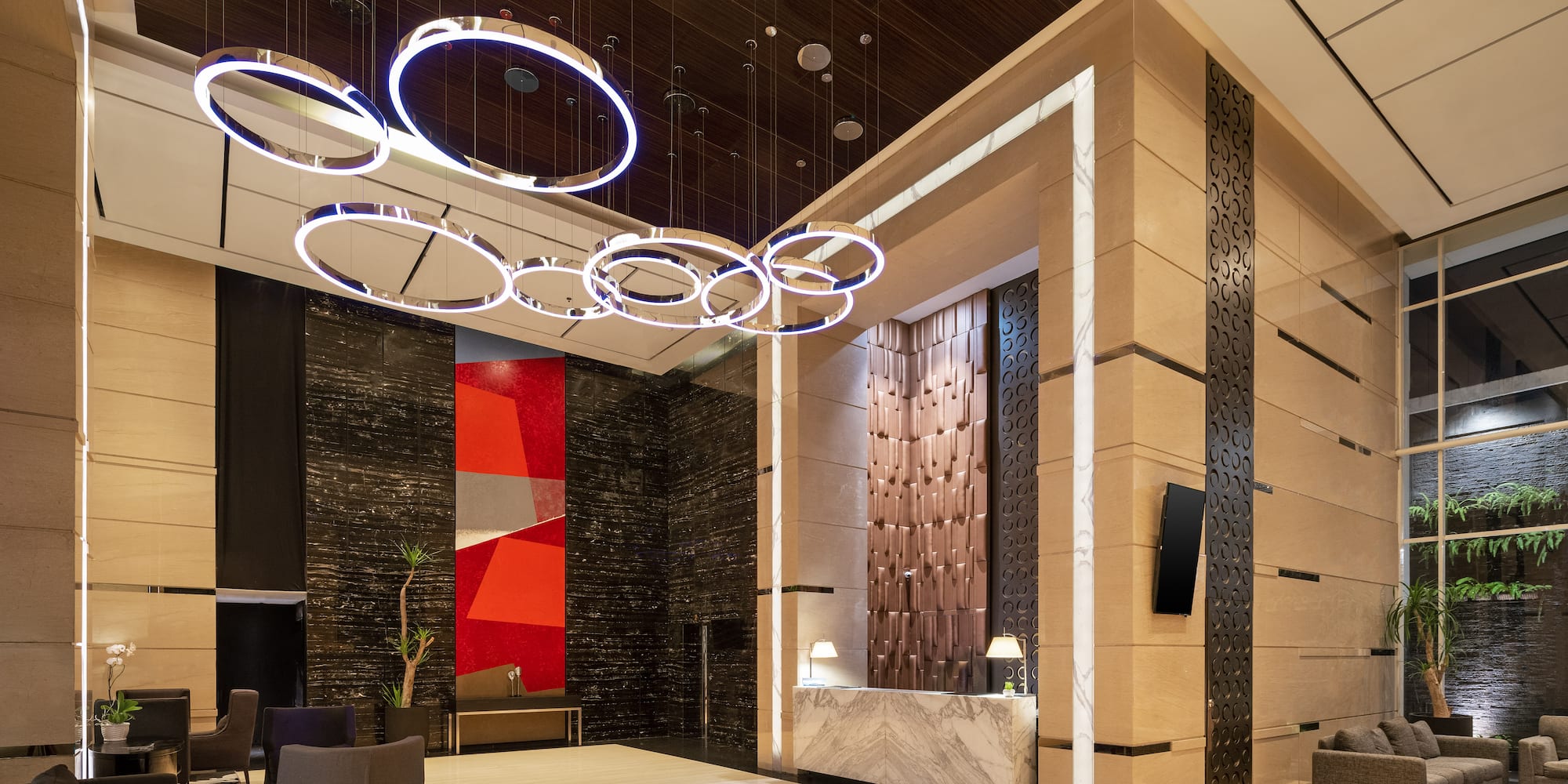 a lobby with a reception desk and a counter