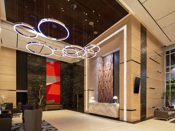 a lobby with a reception desk and a counter