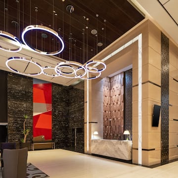 a lobby with a reception desk and a counter