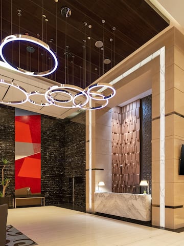 a lobby with a reception desk and a counter