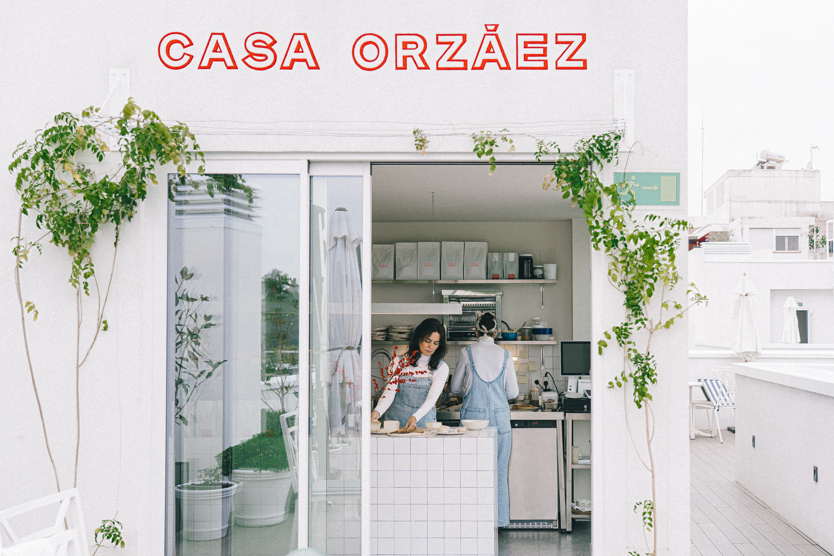 a white buildings on a cliff