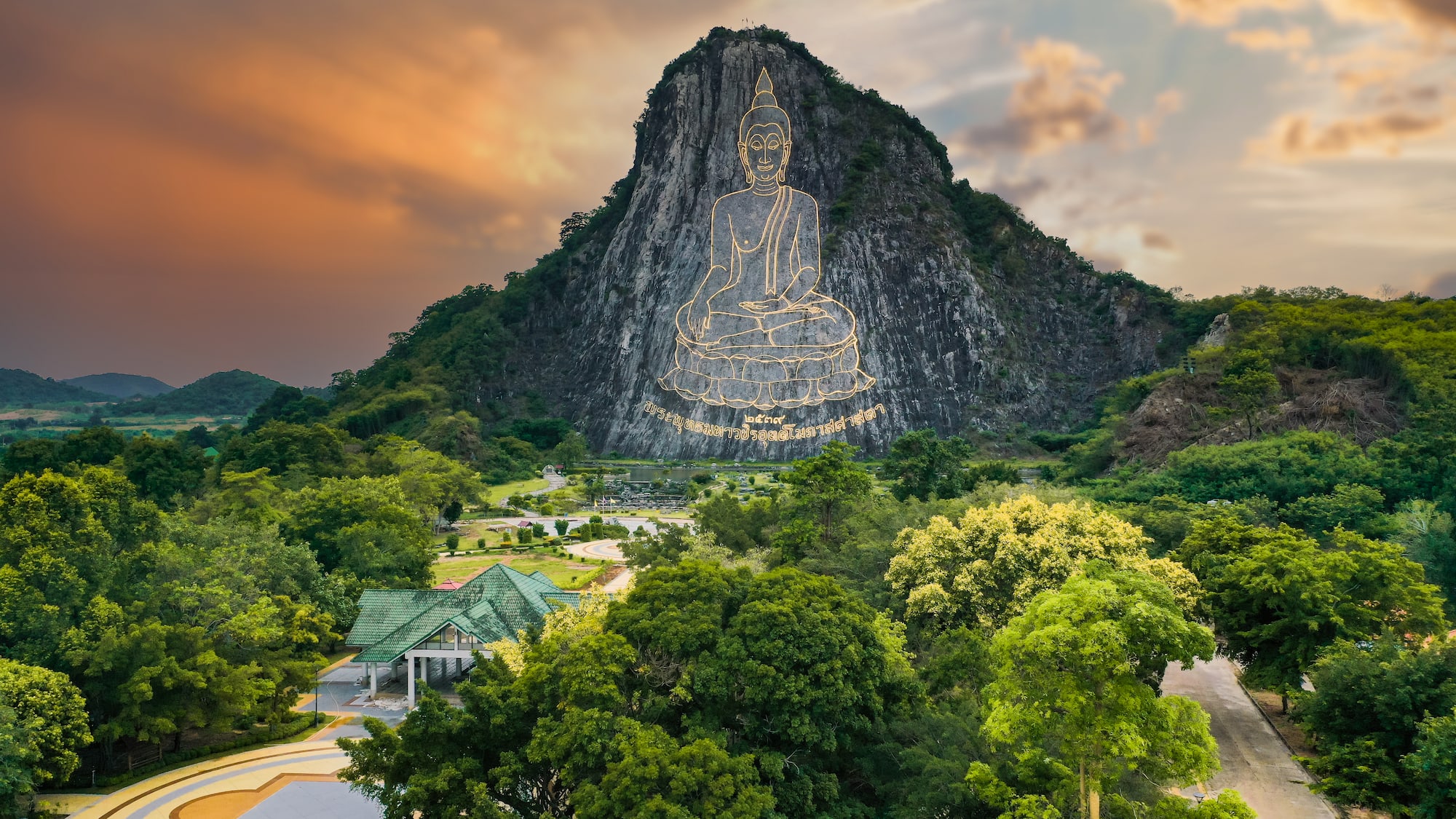 a mountain with a statue on it
