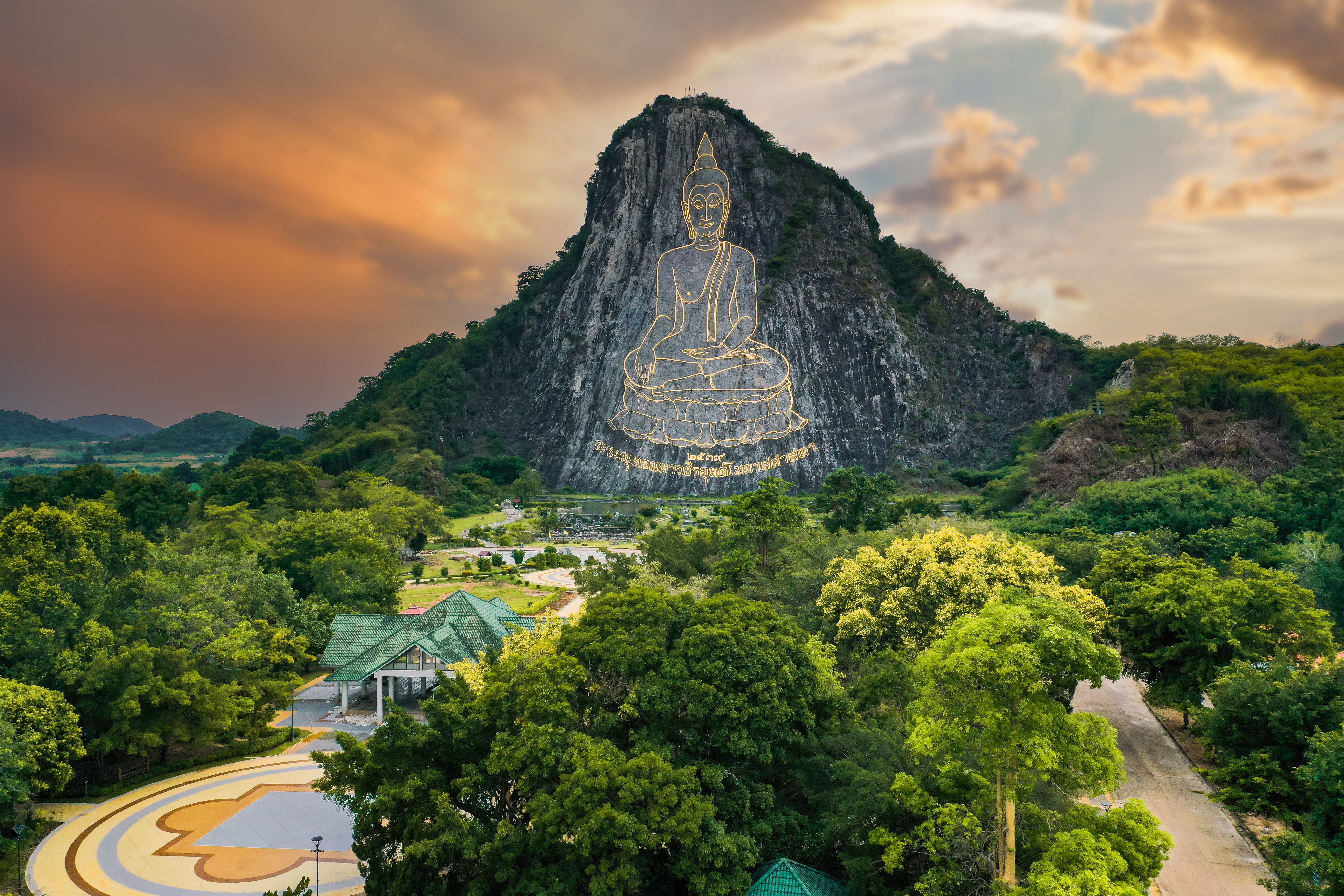 a mountain with a statue on it