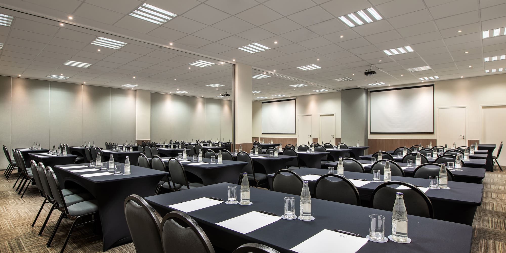 a room with tables and chairs