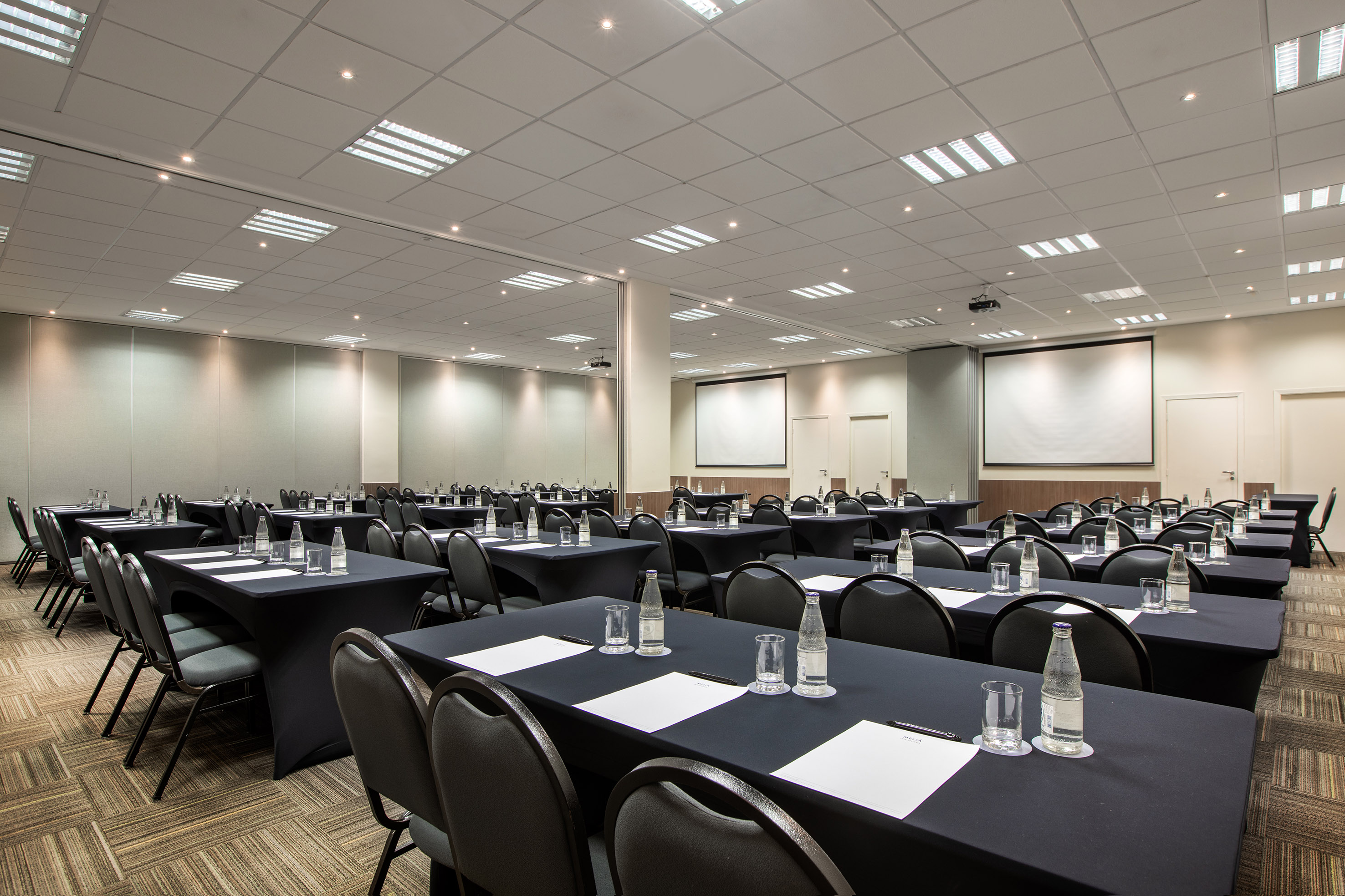 a room with tables and chairs