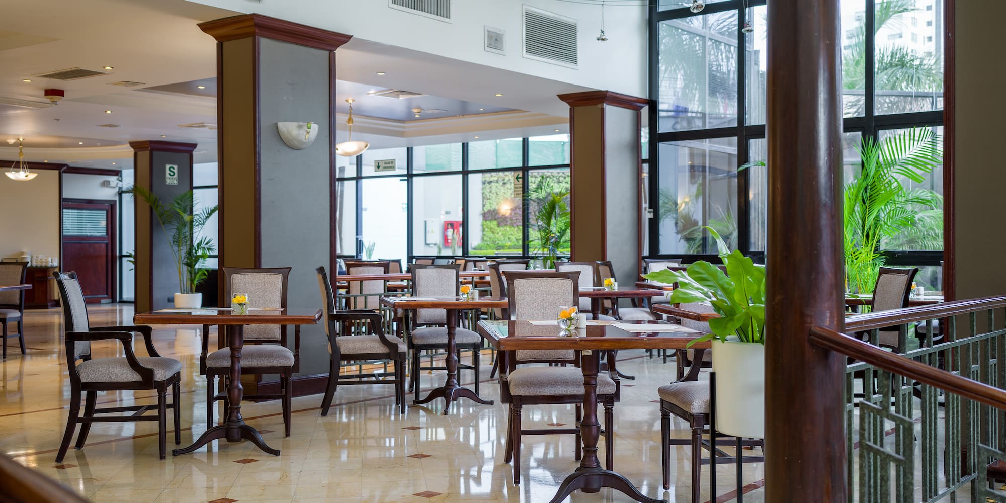 a room with tables and chairs