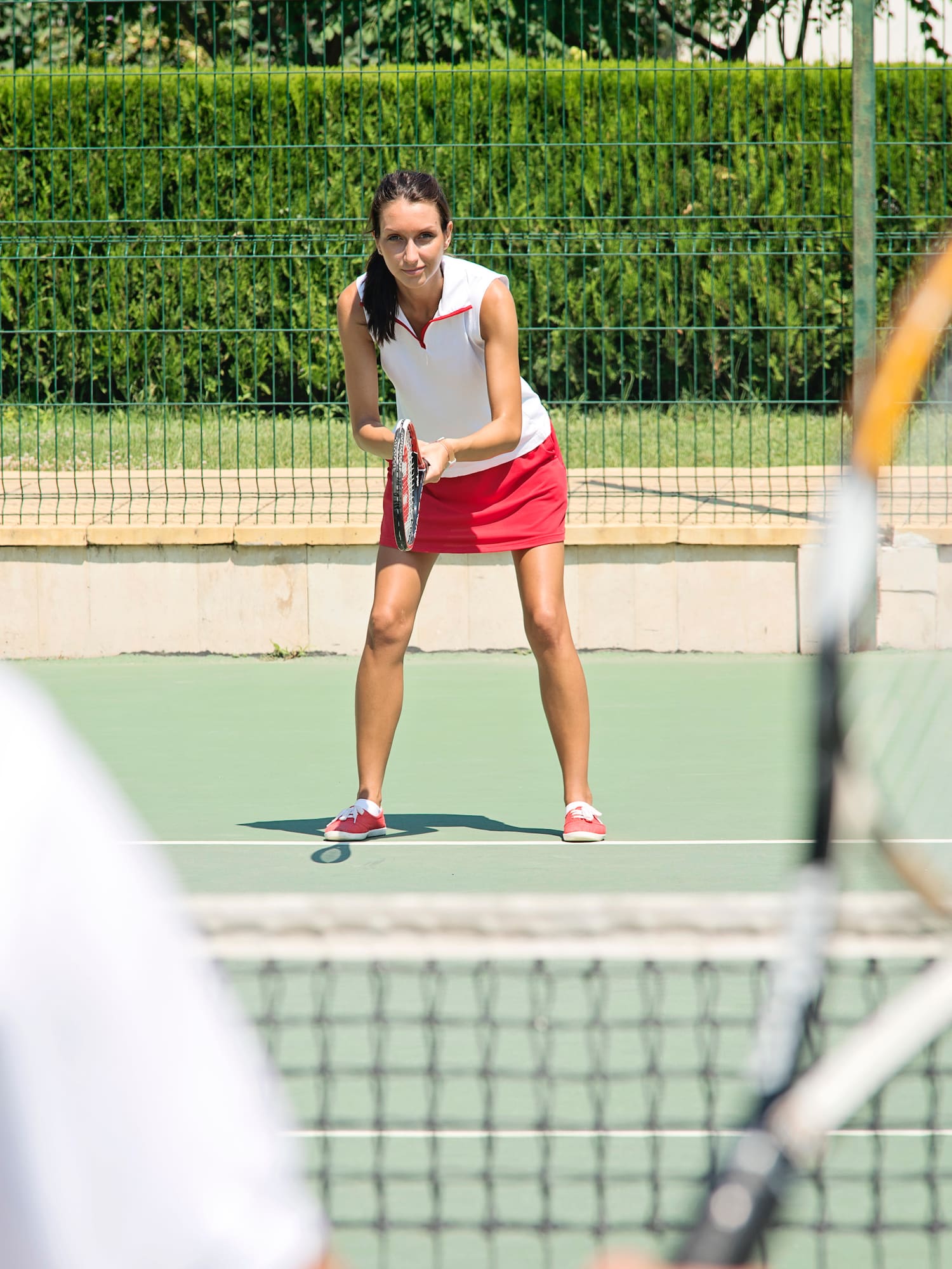 a woman holding a tennis racket