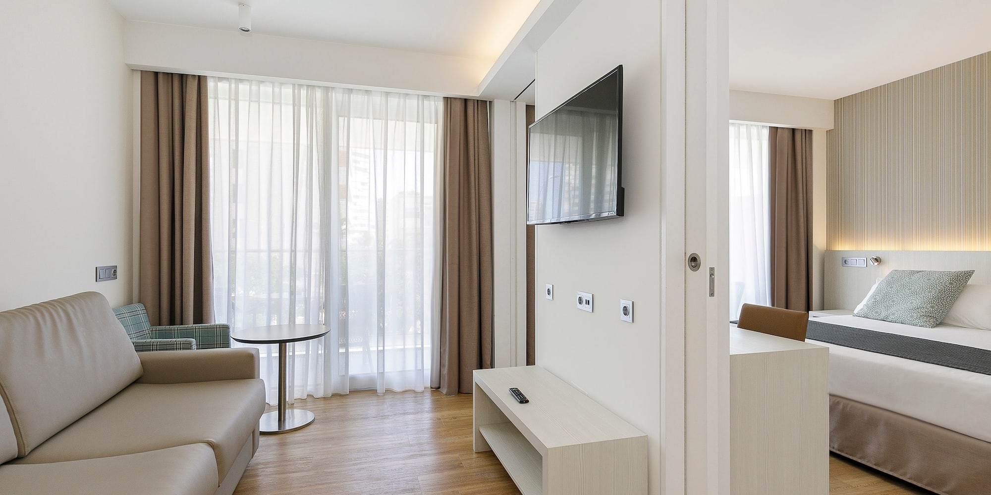 a room with a television and a couch