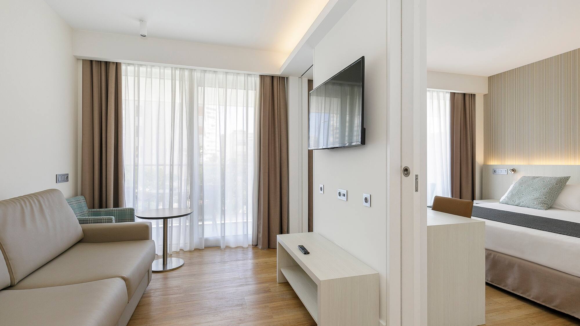 a room with a television and a couch