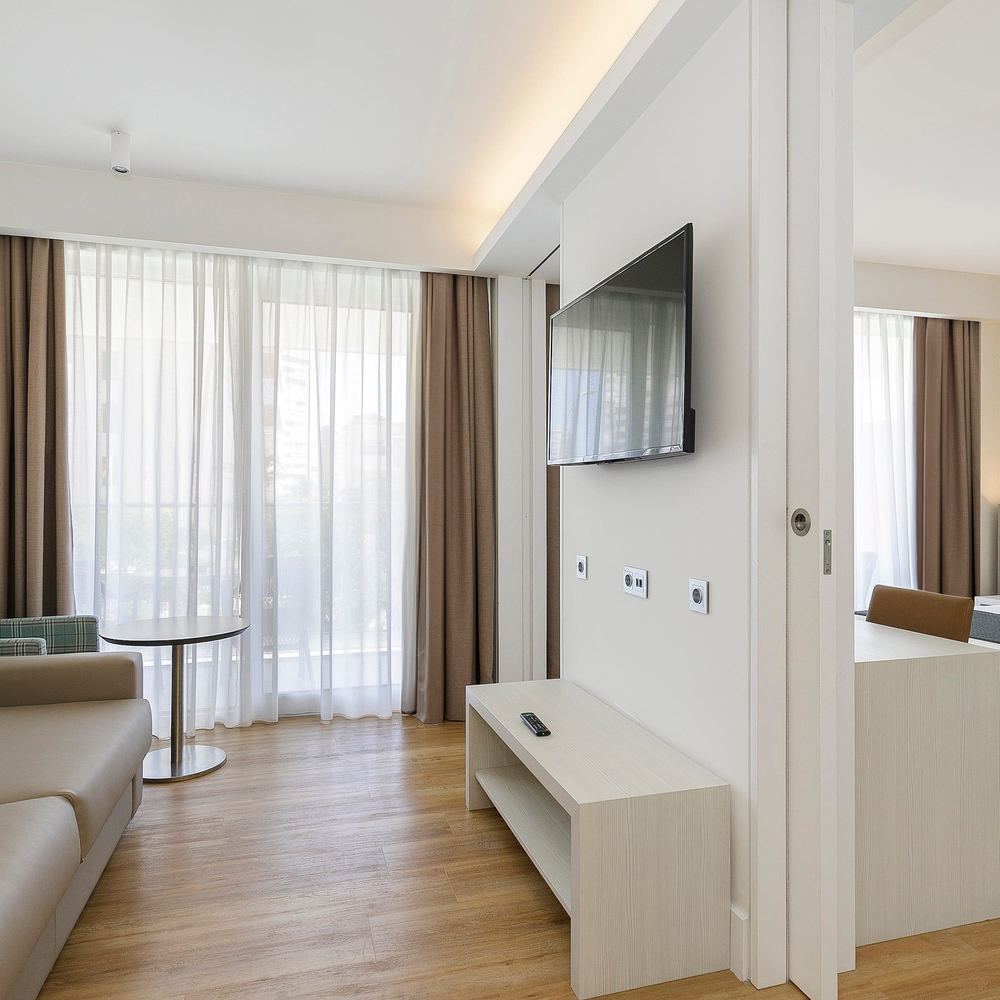 a room with a television and a couch