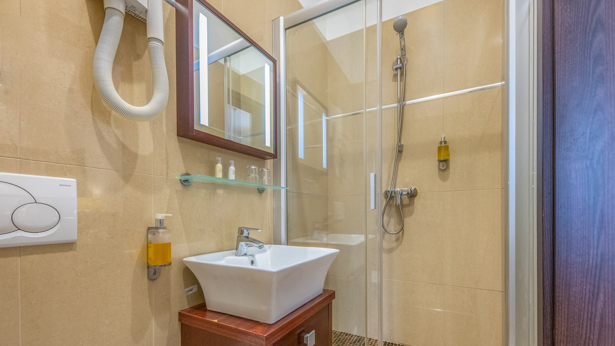 a bathroom with a shower and sink