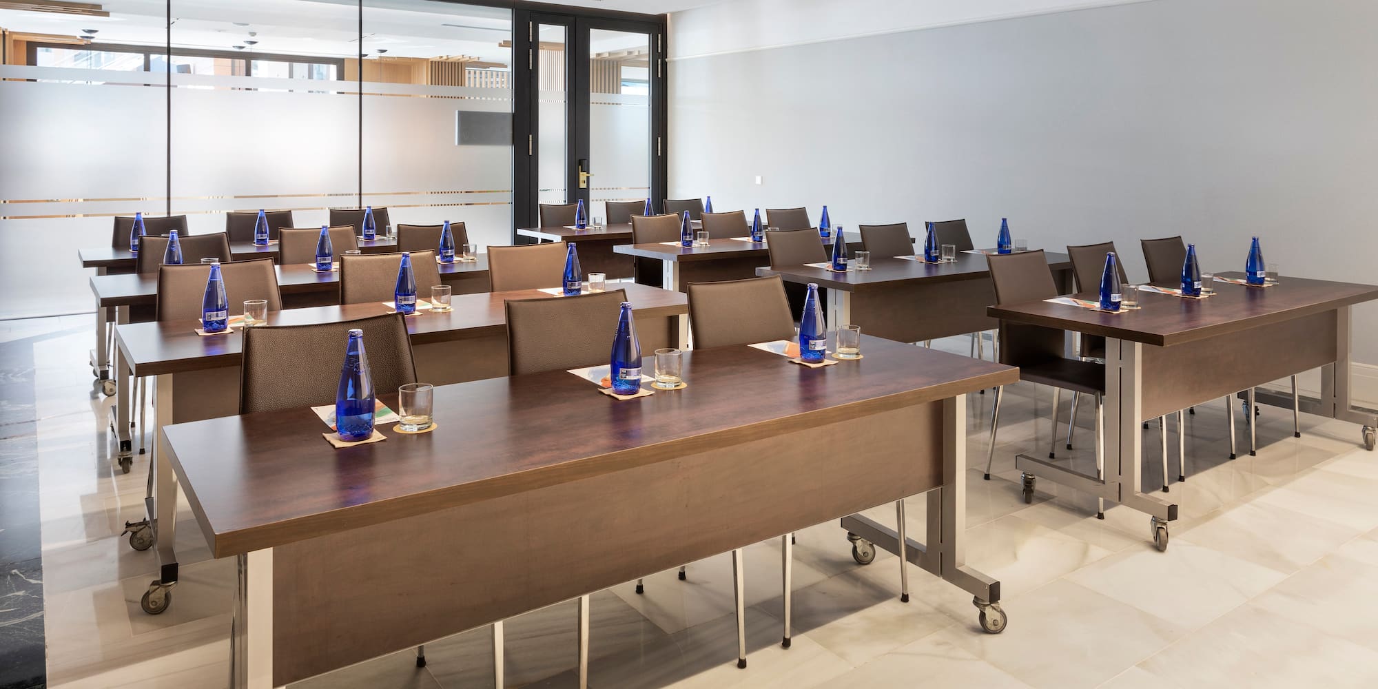 a room with tables and chairs