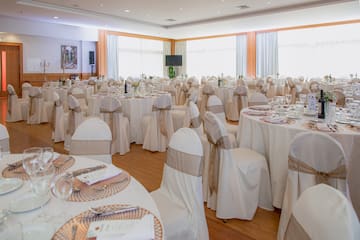 a room with tables and chairs