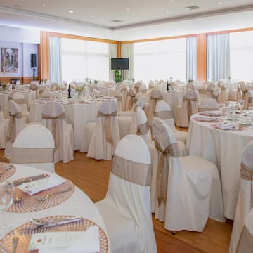 a room with tables and chairs