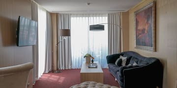 a living room with a couch and a table