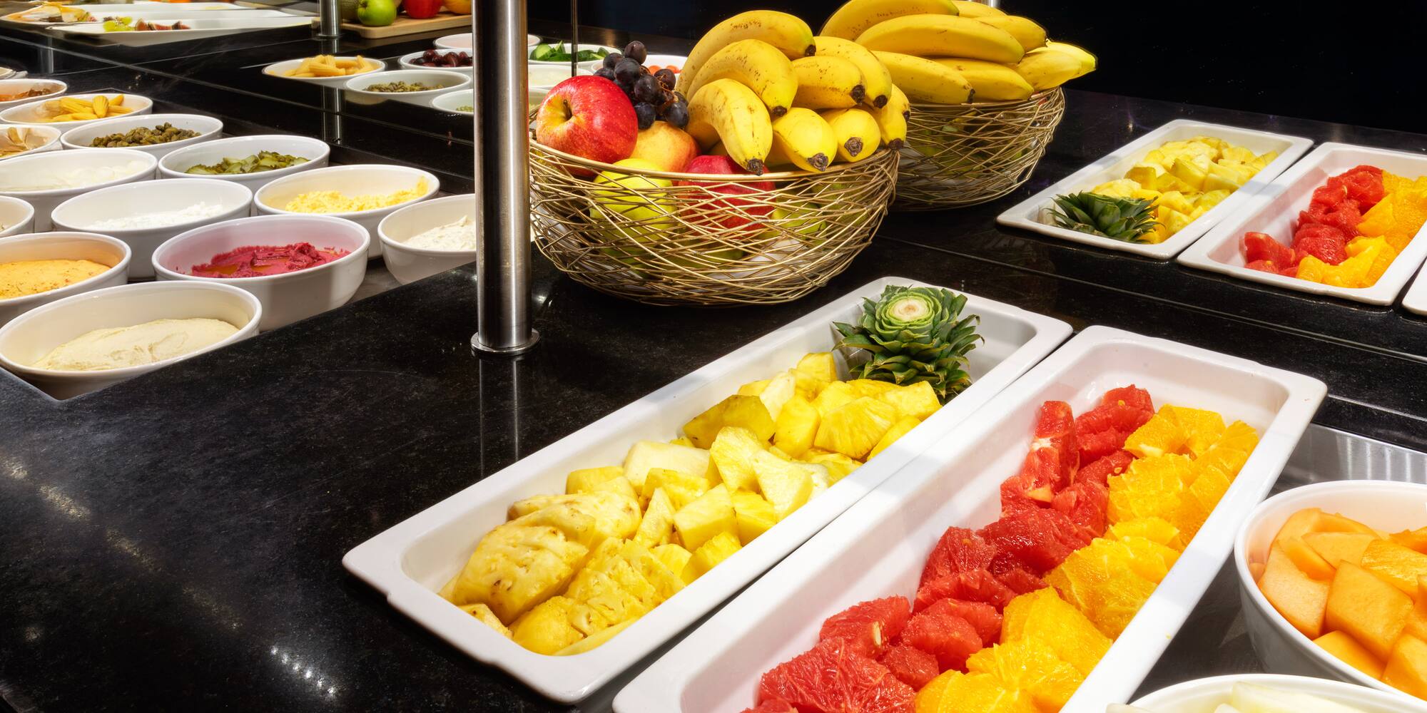 a buffet with different types of fruits