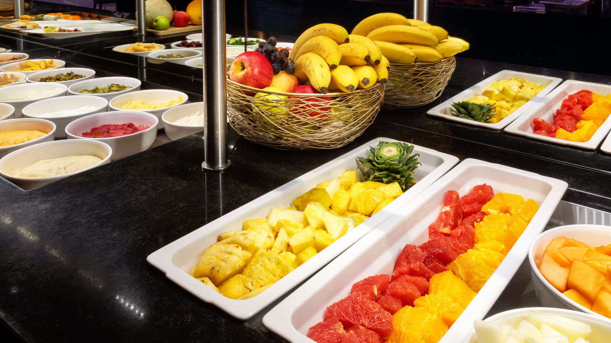 a buffet with different types of fruits