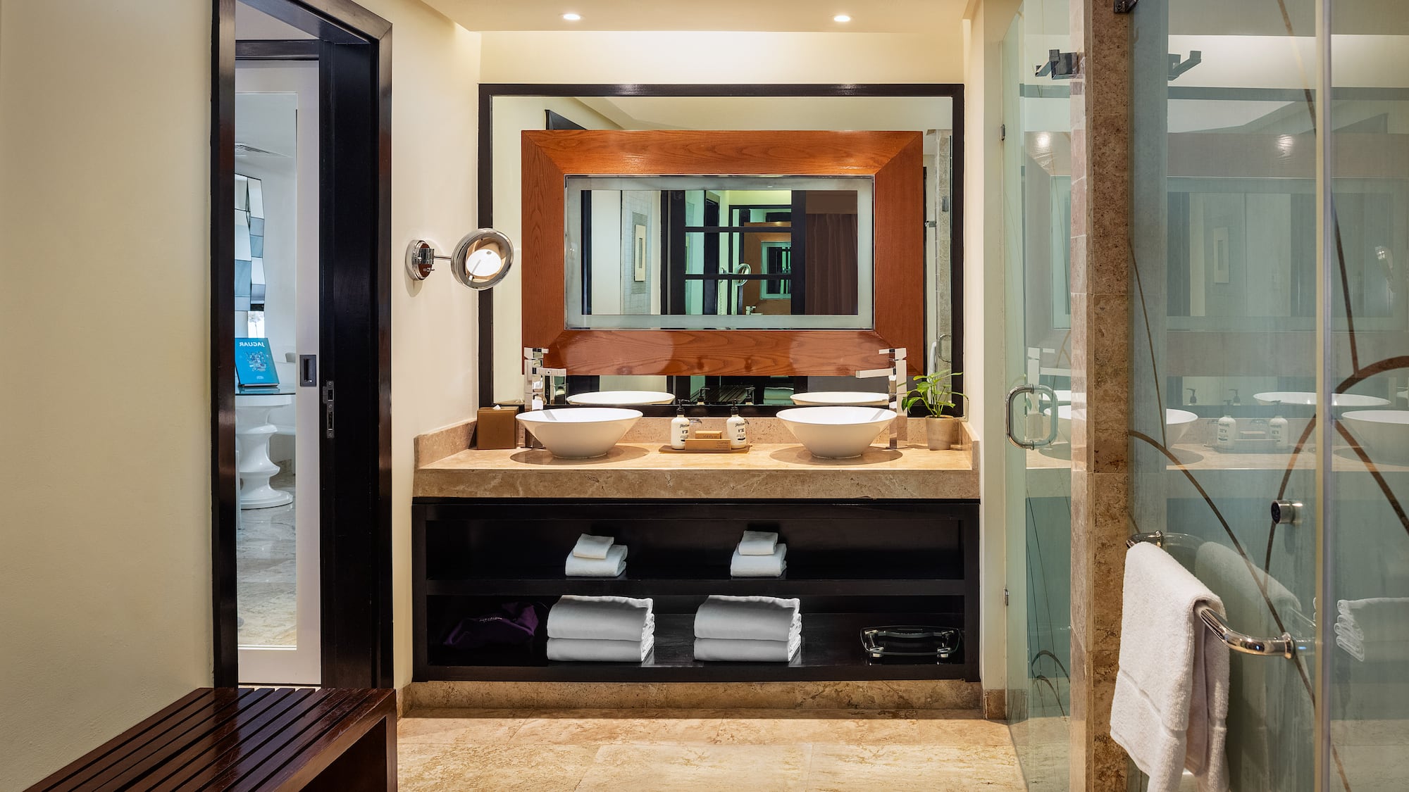 a bathroom with a mirror and sink